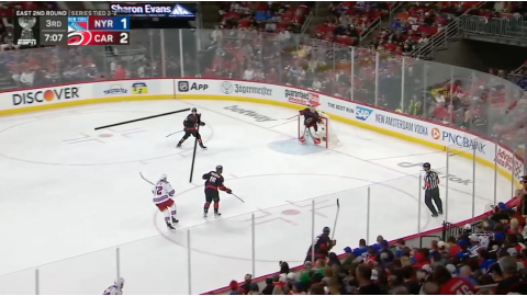 Pesce Shoulder Checks as He Retrieves the Puck in the Defensive Zone